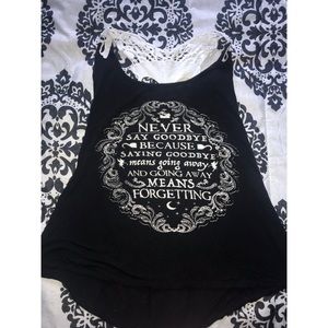 Black, comfy tank top. skull design on the back